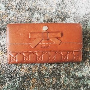 Vintage authentic Gucci manogram brown wallet